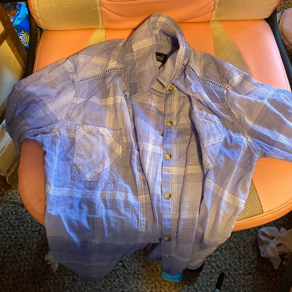 This is a blue button up a size small